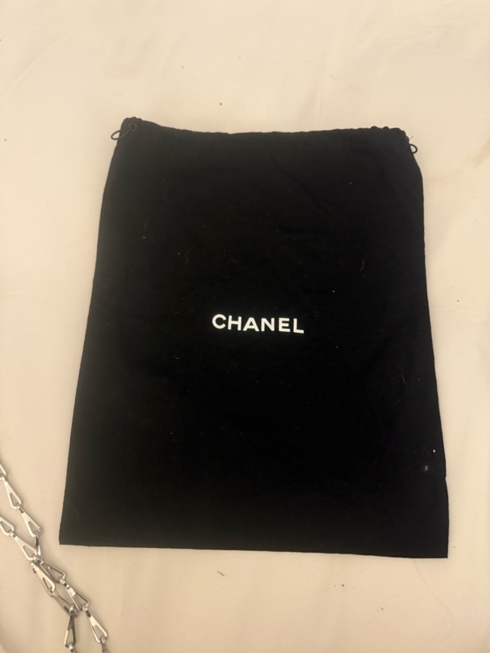 CHANEL Black Drawstring Pouch White Logo